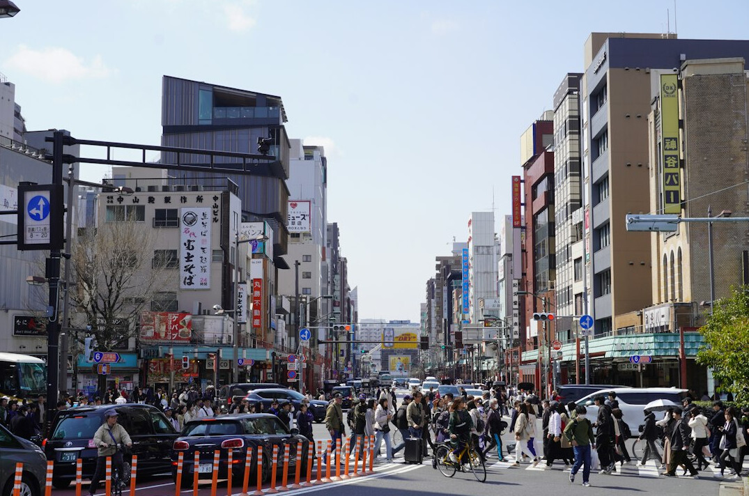 commuters walking busy street