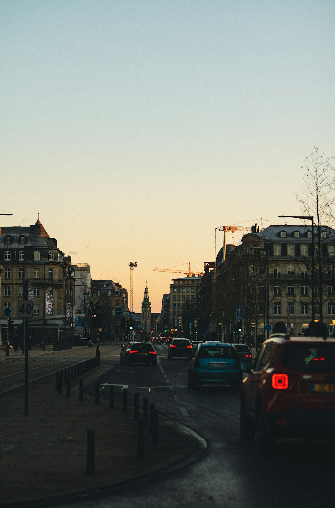 crowded city street at dawn