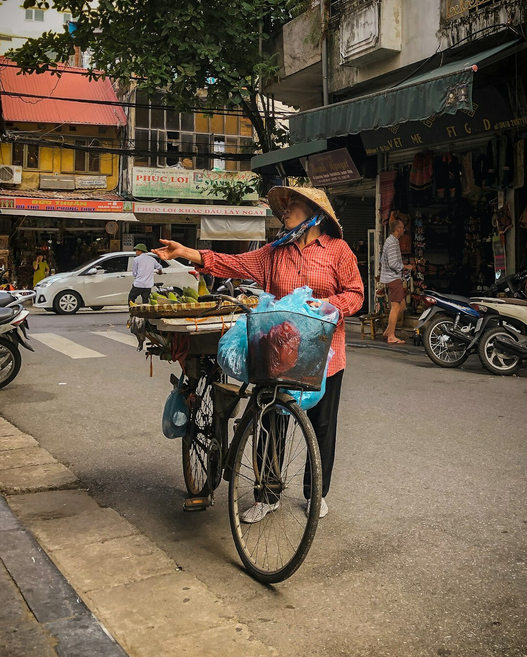 street vendor arranging fruit